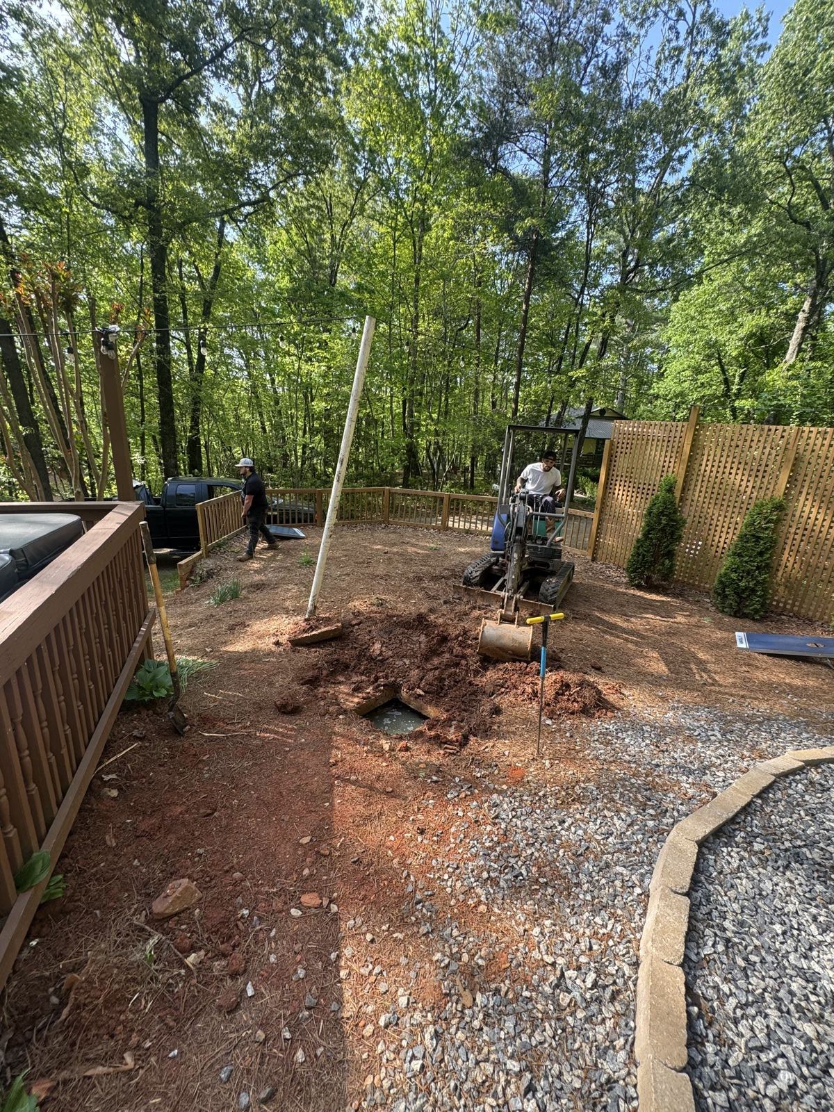 Backyard septic tank access restored and re-seeded after service — Septic Tank Cleaning in Duluth, GA