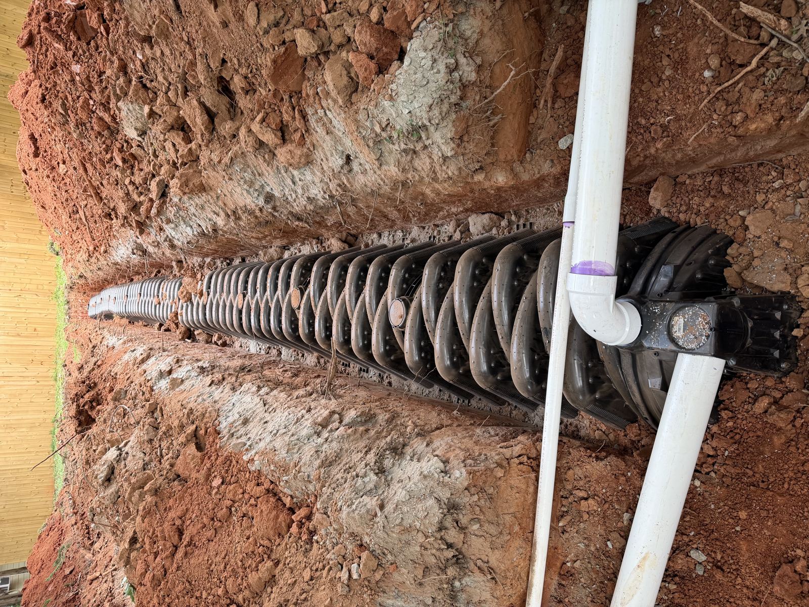 Septic tank and distribution box being set during a new install — Septic Tank Cleaning in Buford, GA