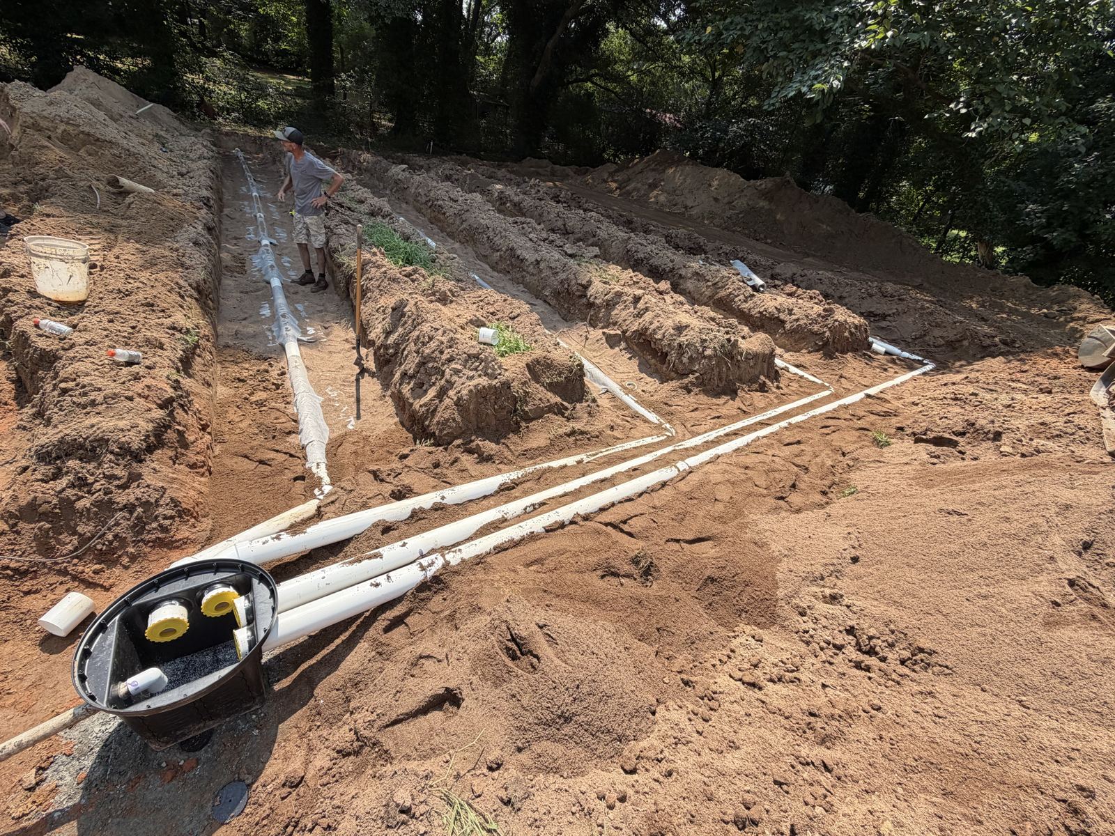 Residential property with septic system excavation underway — Septic Tank Cleaning in Gainesville, GA