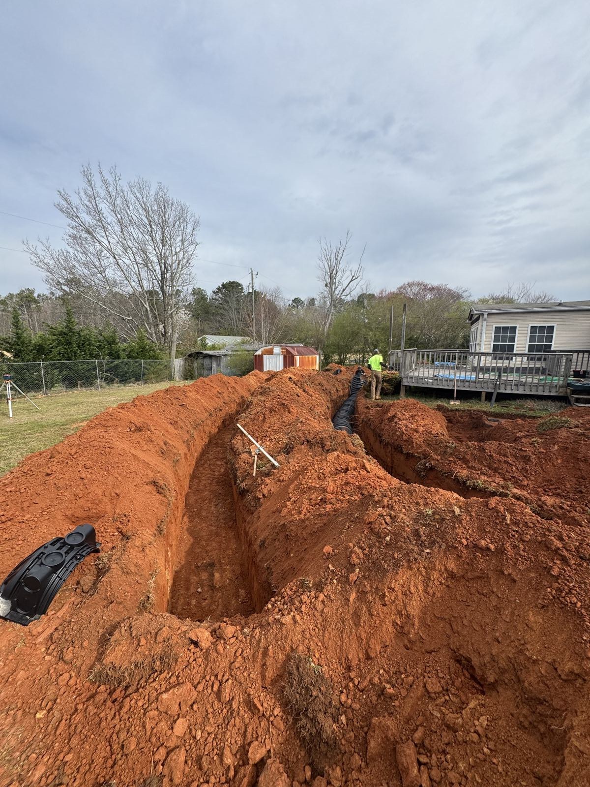 Crew working inside a commercial vault or lift station — Septic Tank Cleaning in Braselton, GA